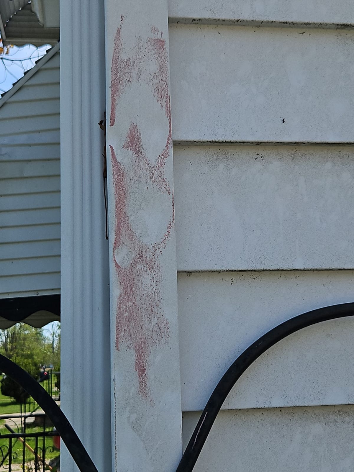 Chalk rubbed flat across the siding makes otherwise-invisible hail dents pop — the fastest way to prove impacts an adjuster calls 'cosmetic.'