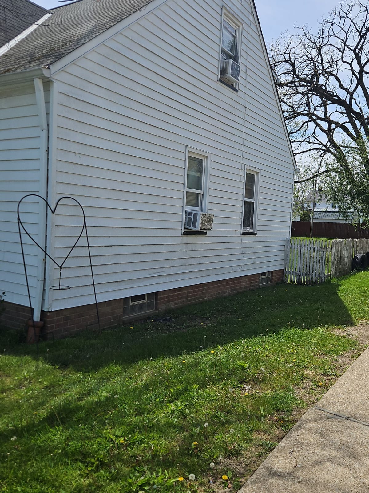 The full elevation documented — hail is proven by the pattern across the whole home, not a single dent.