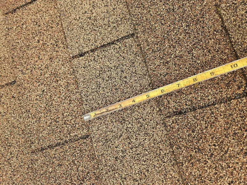A tape measure ties the damage to a provable, repairable scope.