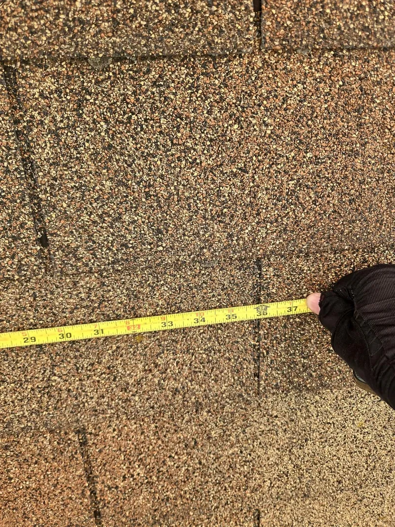 Measuring and documenting each damaged area — the record the insurer's adjuster rarely produces.